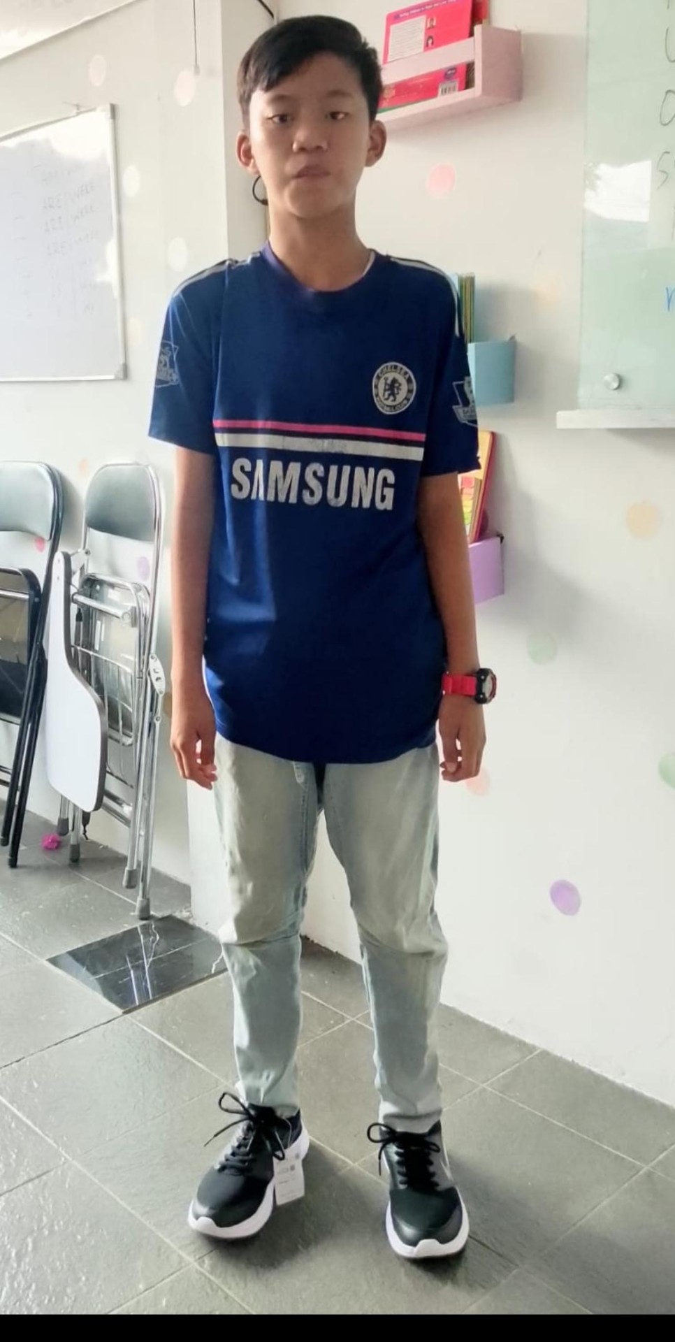 A student wearing new school shoes provided through the back-to-school project.