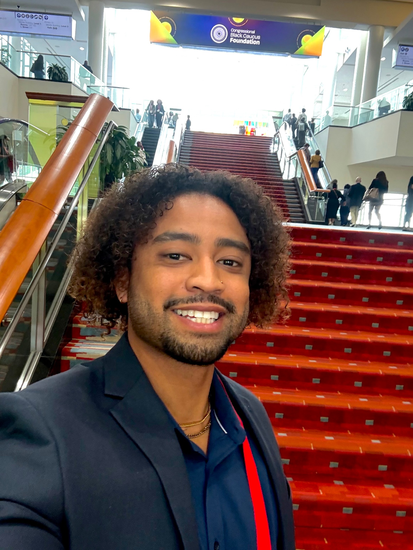 Jimmy Thomas at a Congressional Black Caucus Foundation event in Washington, D.C., wearing a navy blazer.